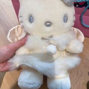 Cream Plush Toy with Silver Accents